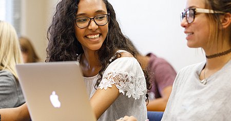 Students in class with laptop